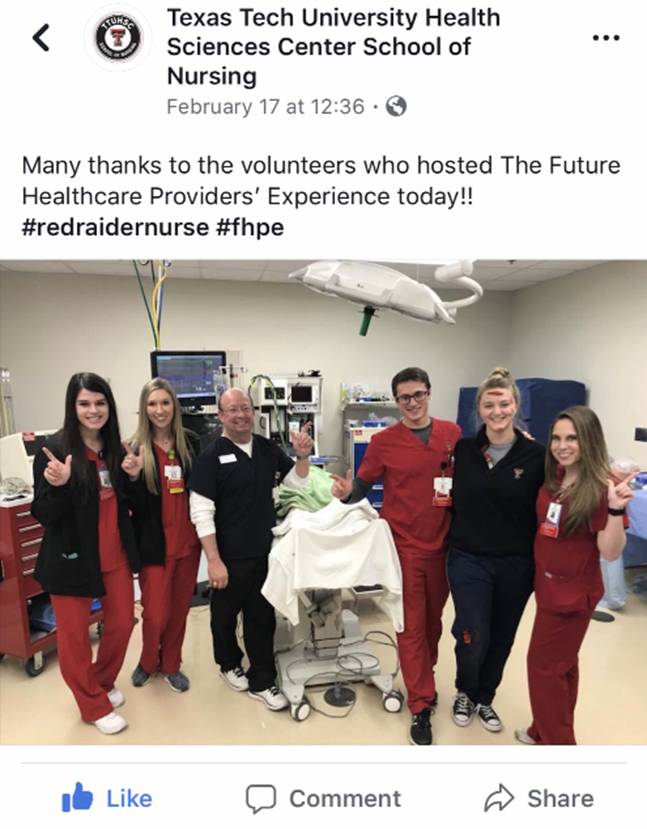 A group of people posing for a photo

Description automatically generated