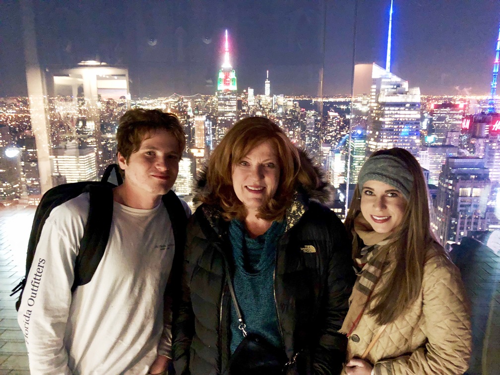 A group of people posing for a picture

Description automatically generated