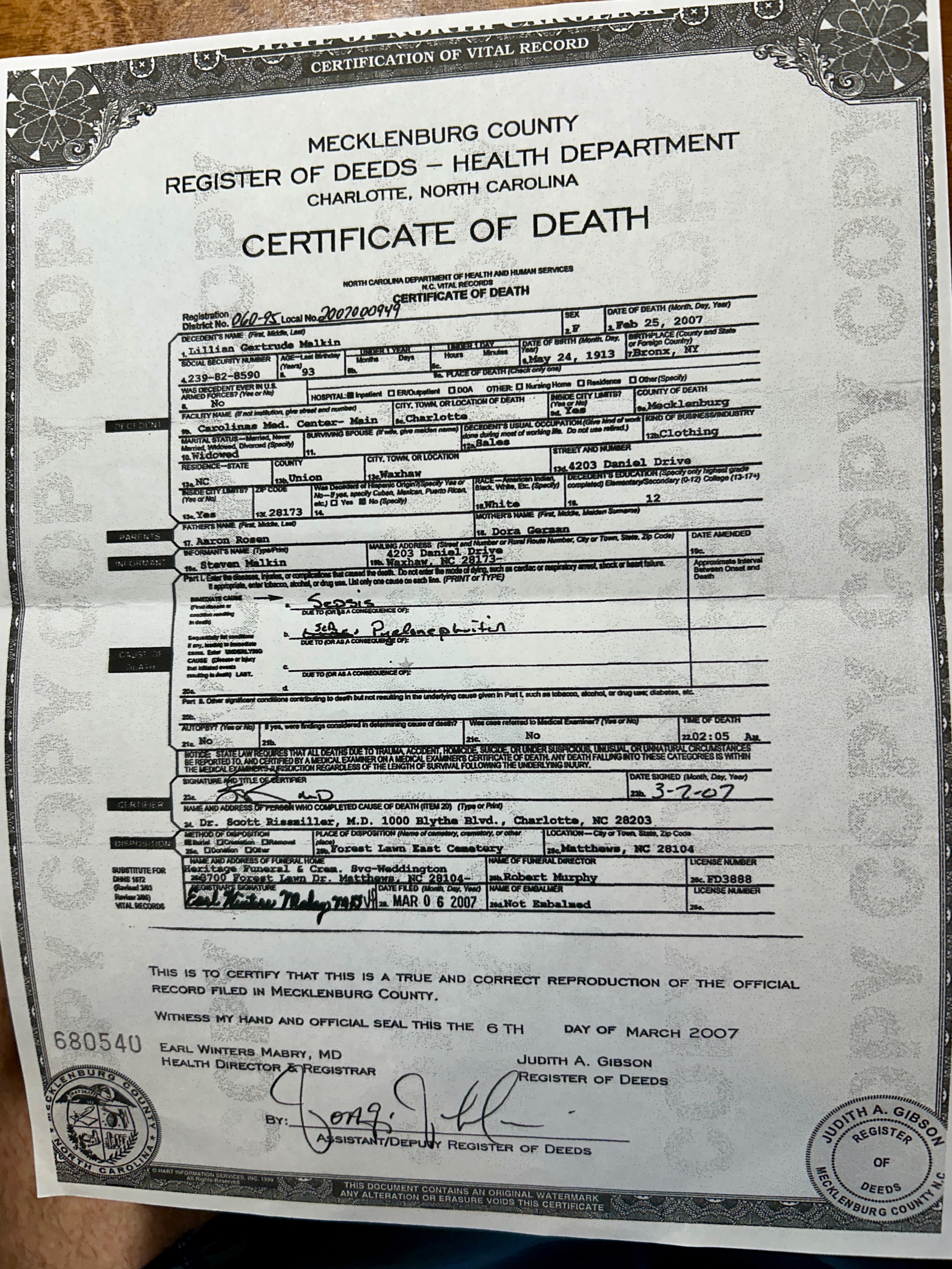 A document with a signature

Description automatically generated