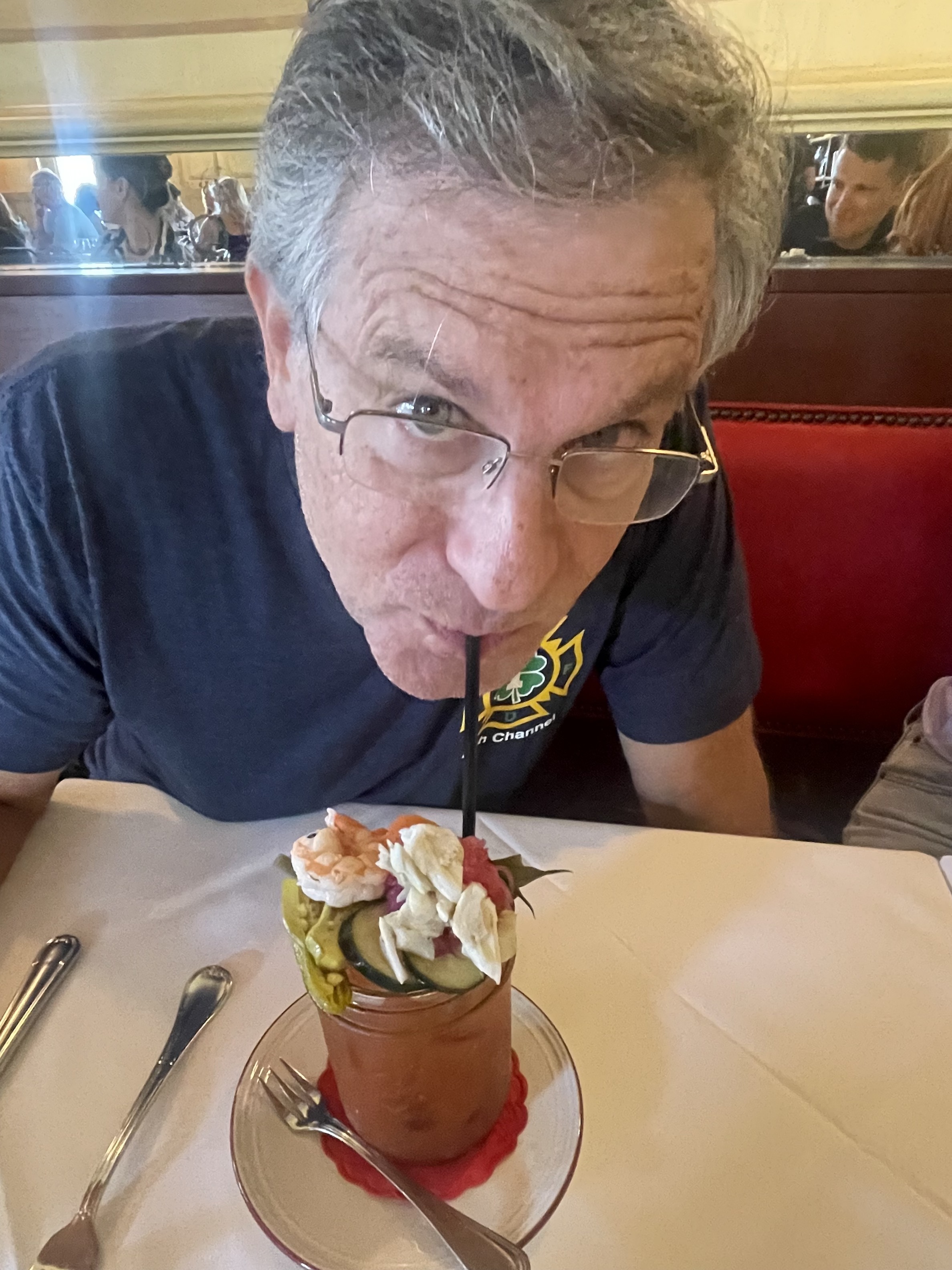 A person drinking from a straw
Description automatically generated