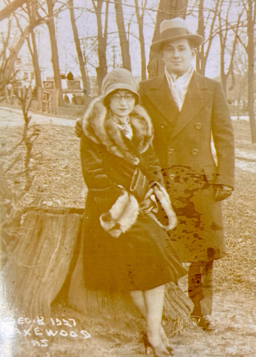 A person and person posing for a picture

Description automatically generated